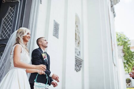 Happy young couple poses for photographers on her happiest day.の写真素材