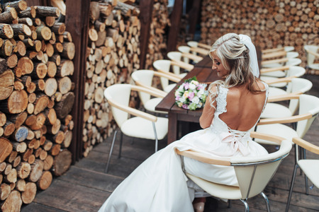 Portrait of gorgeous bride with a wedding bouquetの写真素材