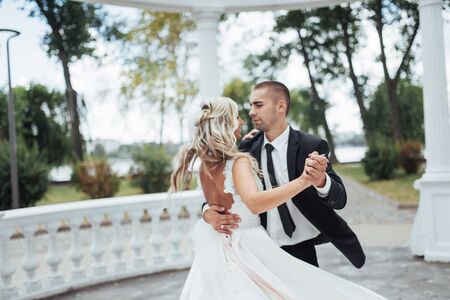 Happy young couple poses for photographers on her happiest day.の写真素材