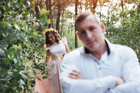 Beautiful happy couple on a walk in the woodsの写真素材