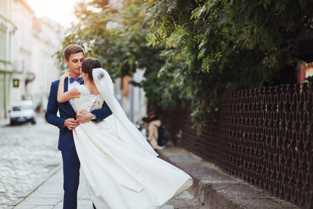 portrait of happy wedding couple outdoors.の写真素材