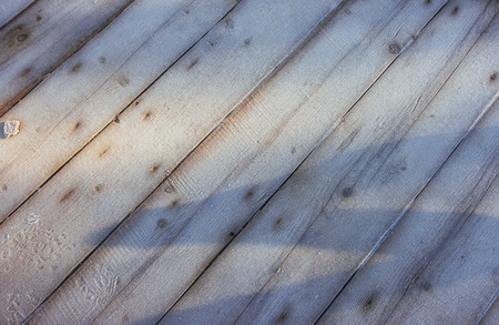 Wood texture with snow christmas background. Happy New Year.の写真素材