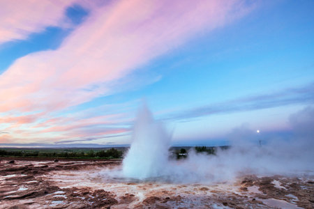 Strokkur geyser eruption in Iceland. Fantastic colors shine throの写真素材