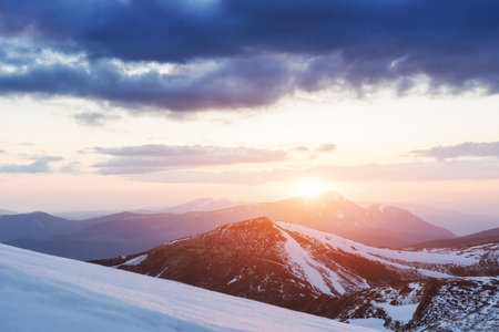 Colorful spring sunset over the mountain ranges in the national