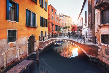 Gondolas on canal in Venice, Italyの写真素材