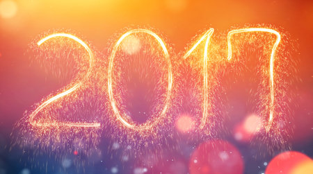 Written with Sparkle firework, New year  concept on background  gold shimmering light and bokeh.