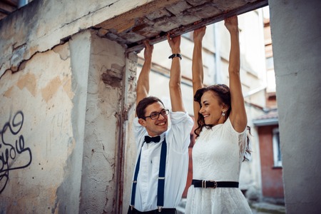 happy and loving couple walking and make photo in the old cityの写真素材