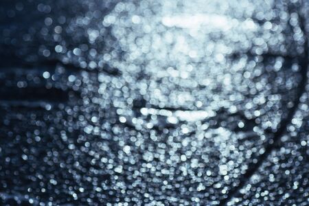 abstract background, soft blue bokeh circles, texture of iceの写真素材