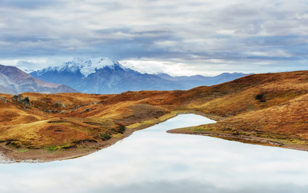 Snowy autumn mountain ridges panoramic view. Carpathians.