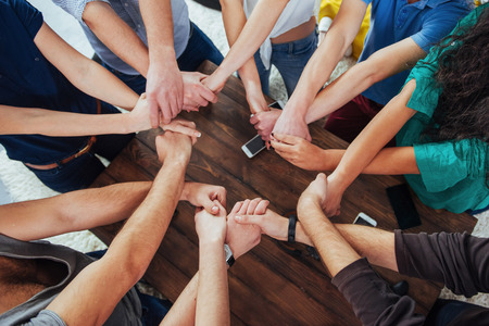 Group of Diverse Hands Together Joining. Concept of teamwork and friendship.の写真素材