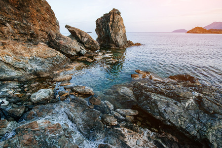 Huge rocks, cliffs and rocks along the coast.の写真素材