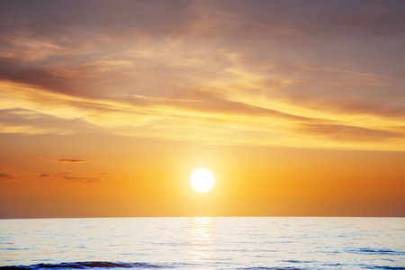 orange sunset over the seaの写真素材