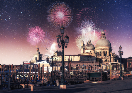 Venice. Photo greeting card. Colorful fireworks on the black sky backgroundの写真素材