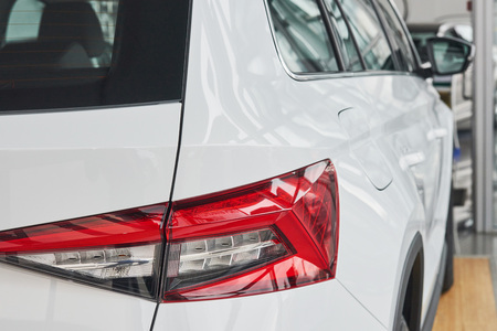 Rear view of luxury a car in salonの写真素材