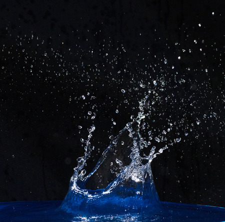 Splash water, water splashes, isolated on black background.の写真素材