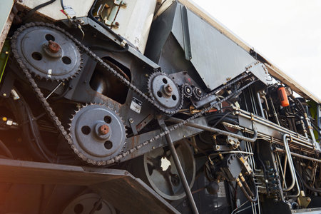 Harvesters and combine parts at the plant are waiting for sales, tractors and agricultural...