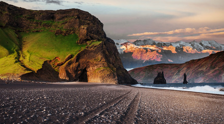 Famous Reynisdrangar rock formations at black Reynisfjara Beach. Coast of the Atlantic ocean near Vik, southern Icelandの写真素材