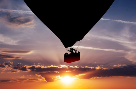 Balloon silhouette in the sunsetの写真素材