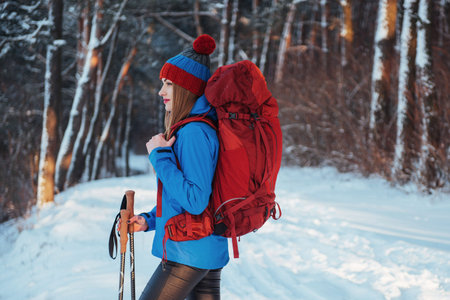 Woman Traveler with backpack hiking Travel Lifestyle adventure concept active vacations outdoor....
