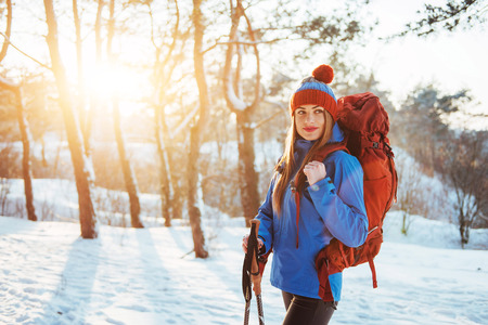 Woman Traveler with backpack hiking Travel Lifestyle adventure concept active vacations outdoor. Beautiful landscape  forestの写真素材