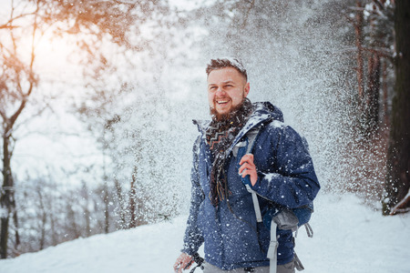 Man Traveler with backpack hiking Travel Lifestyle adventure concept active vacations outdoor. Beautiful landscape  forestの写真素材