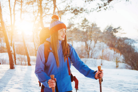 Woman Traveler with backpack hiking Travel Lifestyle adventure concept active vacations outdoor. Beautiful landscape  forestの写真素材