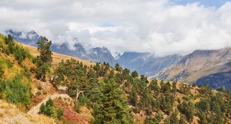 Thick fog on the mountain pass Goulet. Autumn Landscape. Georgia, Svaneti. Caucasus mountainsの写真素材