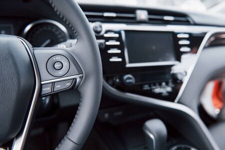 View of the interior of a modern automobile showing the dashboard.の写真素材