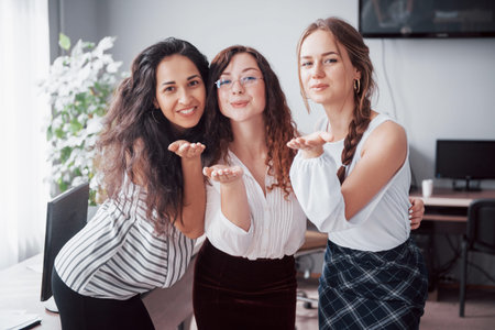 Beautiful women in the office space in the workplace.