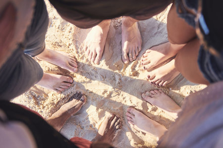 Happy friends have fun on the beach - Young people playing in open air water on summer holidays.