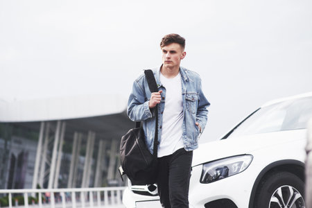 The man expects his flight at the airport
