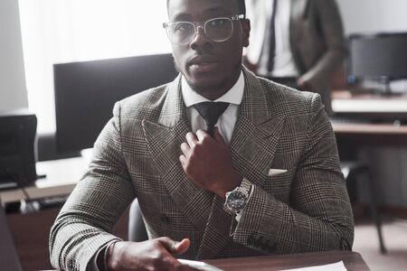 Image of african american businessman working on his laptop.の写真素材