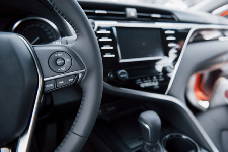 View of the interior of a modern automobile showing the dashboard.