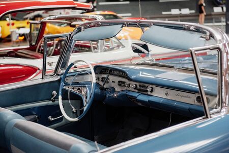 SINSHEIM, GERMANY - OCTOBER 16, 2018: Technik Museum. Taking close look to the blue retro car with vintage design.のeditorial素材