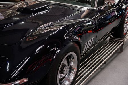 SINSHEIM, GERMANY - OCTOBER 16, 2018: Technik Museum. Close up view. Nice looking old sport car standing on the special stand indoors at automobile show.のeditorial素材