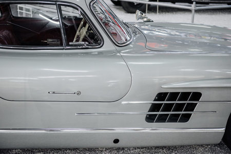 SINSHEIM, GERMANY - OCTOBER 16, 2018: Technik Museum. Right side of white vintage vehicle.