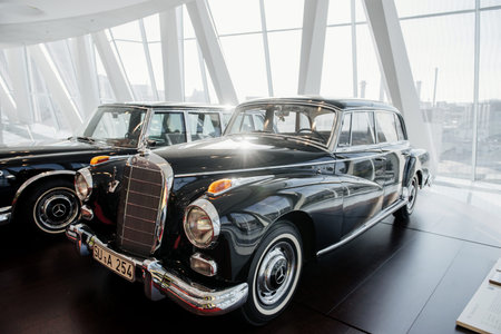 STUTTGART, GERMANY - OCTOBER 16, 2018: Mercedes Museum. Two black good polished retro cars stands...