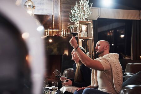 Looks pretty solid. Girl with her boyfriend have nice evening at beautiful restaurant.の写真素材