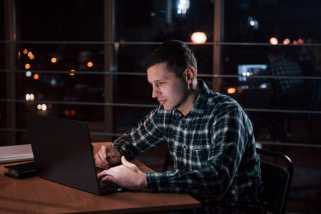 Working for so long gives extra money. Man in the checkered shirt have some additional job at...
