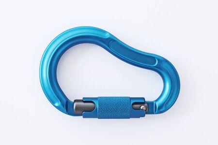 Studio shot. Isolated photo of climbing equipment - blue colored part of carabiner.の写真素材