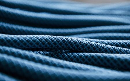 For the strong connections. Many of the blue colored knots for the sports and ship equipment lying down on the floor.の写真素材