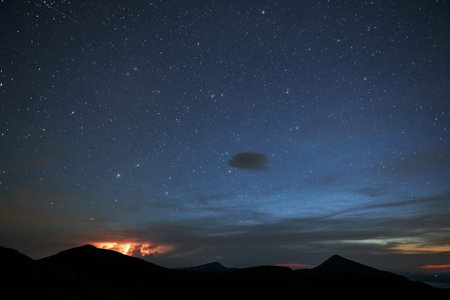 Sky filled with stars. Majestic Carpathian mountains. Beautiful landscape. Breathtaking view.