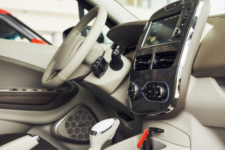 Inside of brand new modern electrical car. Particle view. Cropped photo.の写真素材