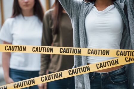 Community of young activists. Group of feminist women have protest for their rights outdoors.の写真素材