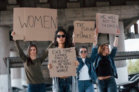Variety of people. Group of feminist women have protest for their rights outdoors.の写真素材