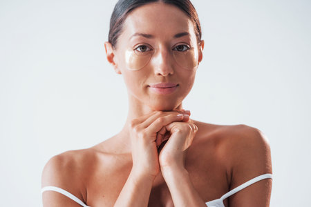 Portrait of woman that is in the studio. Conception of beautyの写真素材