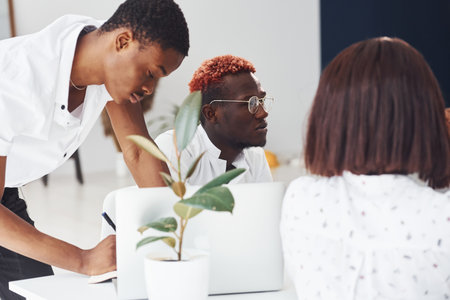 Group of african american business people working in office togetherの写真素材