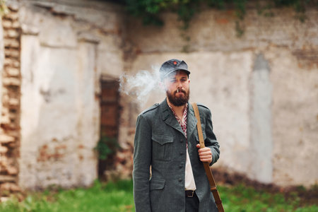 TERNOPIL, UKRAINE - June 2020 UPA Ukrainian Insurgent Army movie filming. Pictures of backstage. Young soldier with weaponのeditorial素材