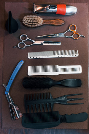 Close up view of vintage barber shop tools that lying down on the tableの写真素材