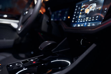 Steering wheel and navigation display. Close up view of front park of new modern black automobileの写真素材